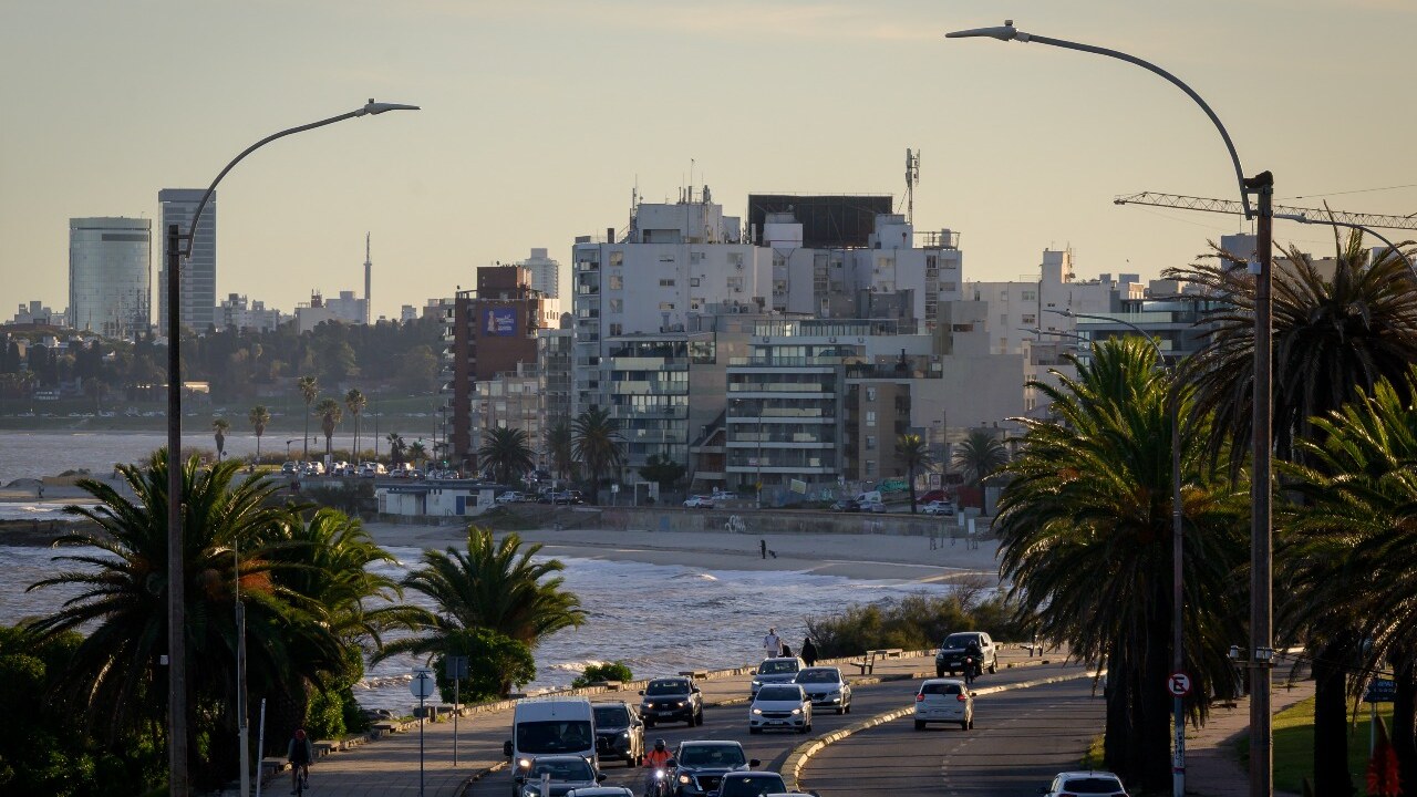 Curved roadside poles and LED luminaires along the municipality’s coastal road